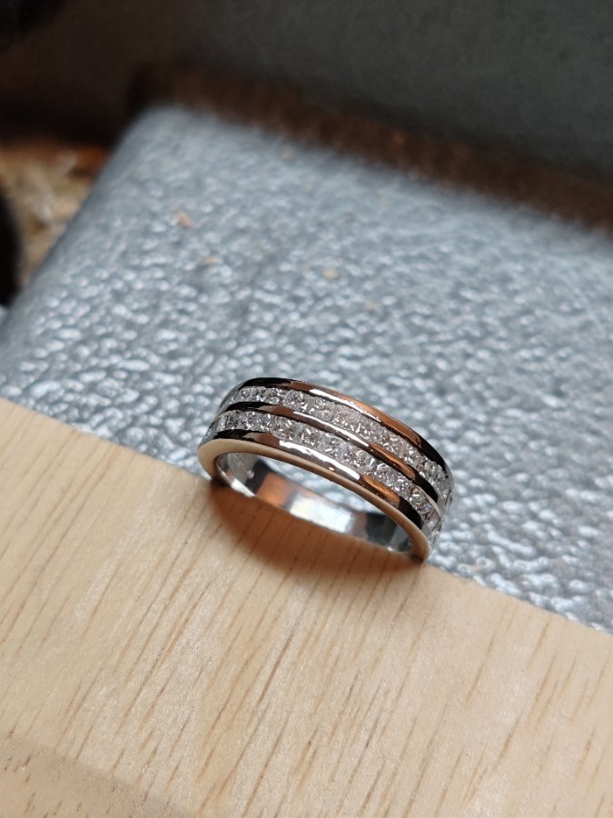 Double row of princess cut diamonds eternity ring