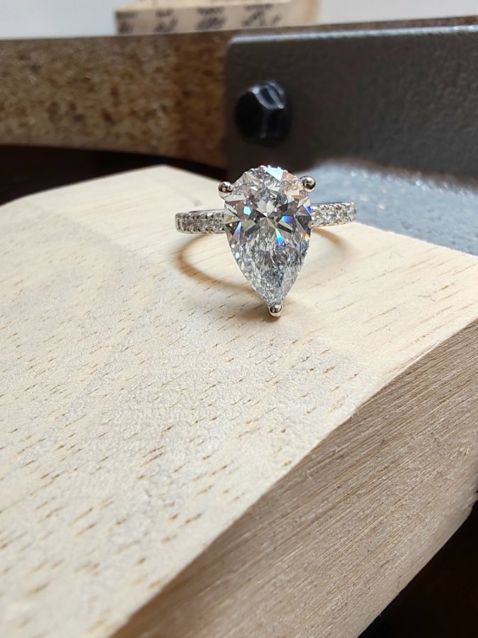 Nature inspired pear diamond ring with sapphires