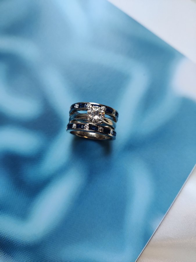 Sapphire and diamond rings on silk